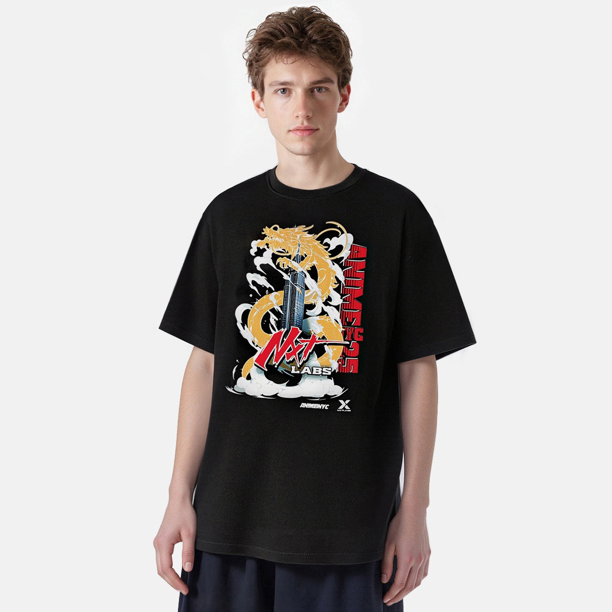 Person wearing a black t-shirt with a colorful graphic design on a white background