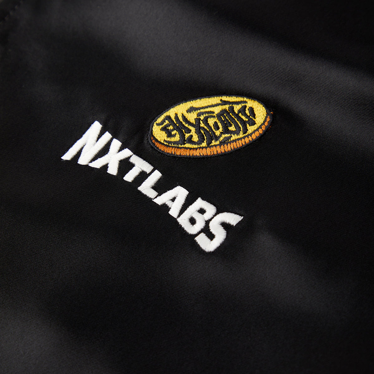 Nxtlabs logo on a black background