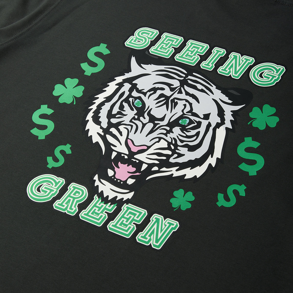 Black t-shirt with a white tiger graphic and green text on a black background