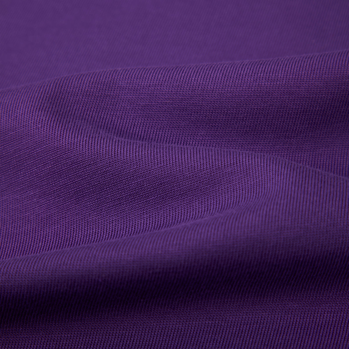 Close-up of purple fabric with visible texture